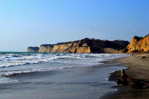 waves surfacing at Playa Canoa in Ecuador