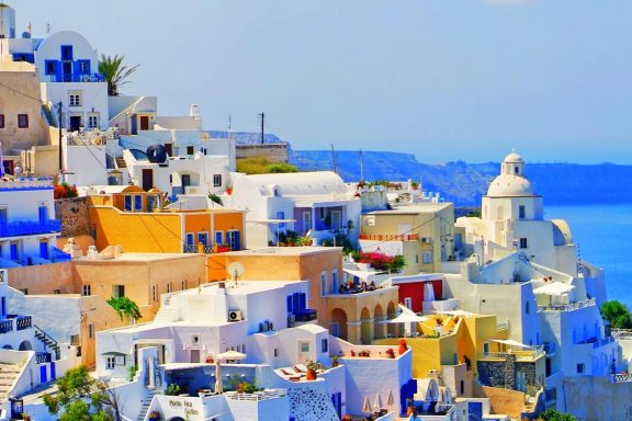 View of the colorful buildings near coastal Greece