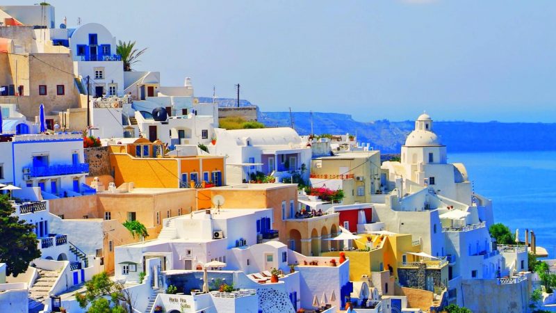 View of the colorful buildings near coastal Greece