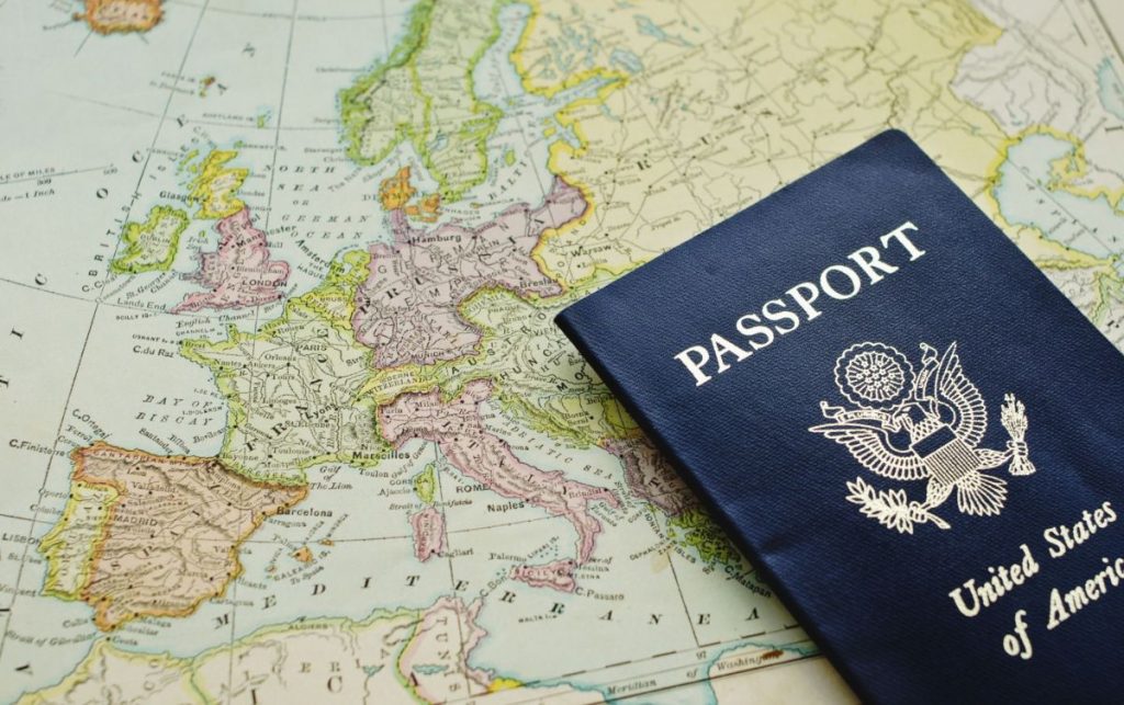 An American passport on a map