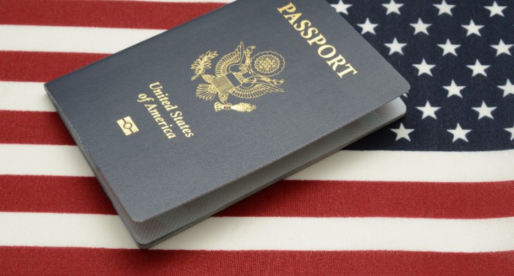 US Passport with an American flag