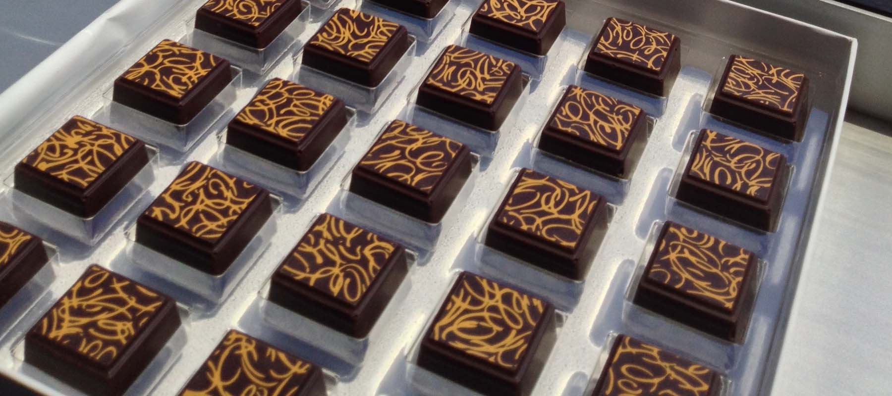 Chocolate delicacies lay on a tray ready to be served at the Chocolate International Salon