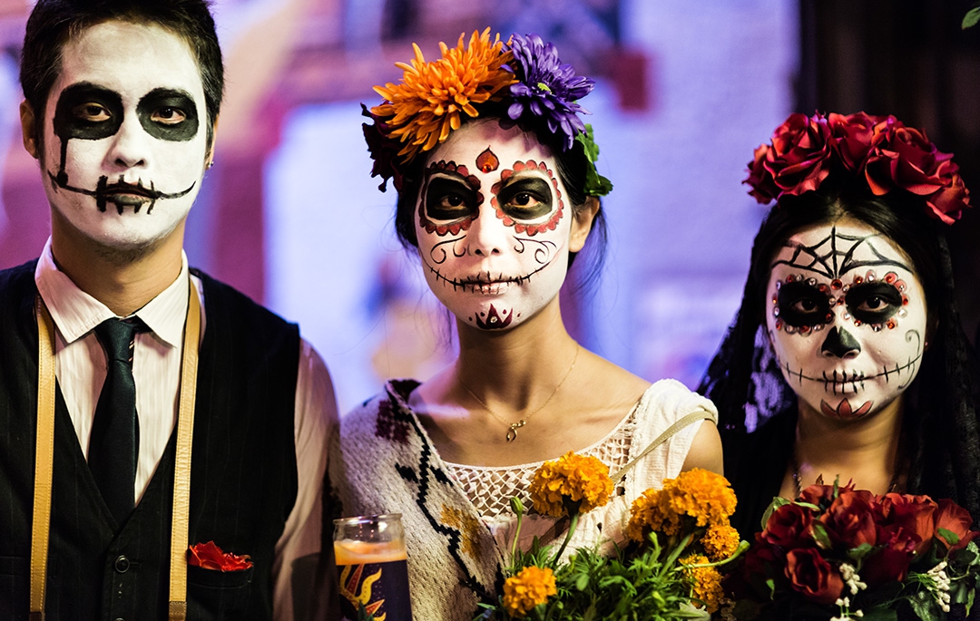 The Dia de Los Muertos is celebrated by traditional Mexican imagery and makeup when people go to pay their respects to their dead loved ones