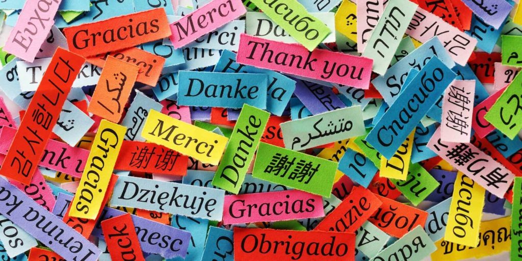 The word thank you written in different languages all in different colors